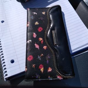 A cute Rebecca Minkoff iphone wallet phone case